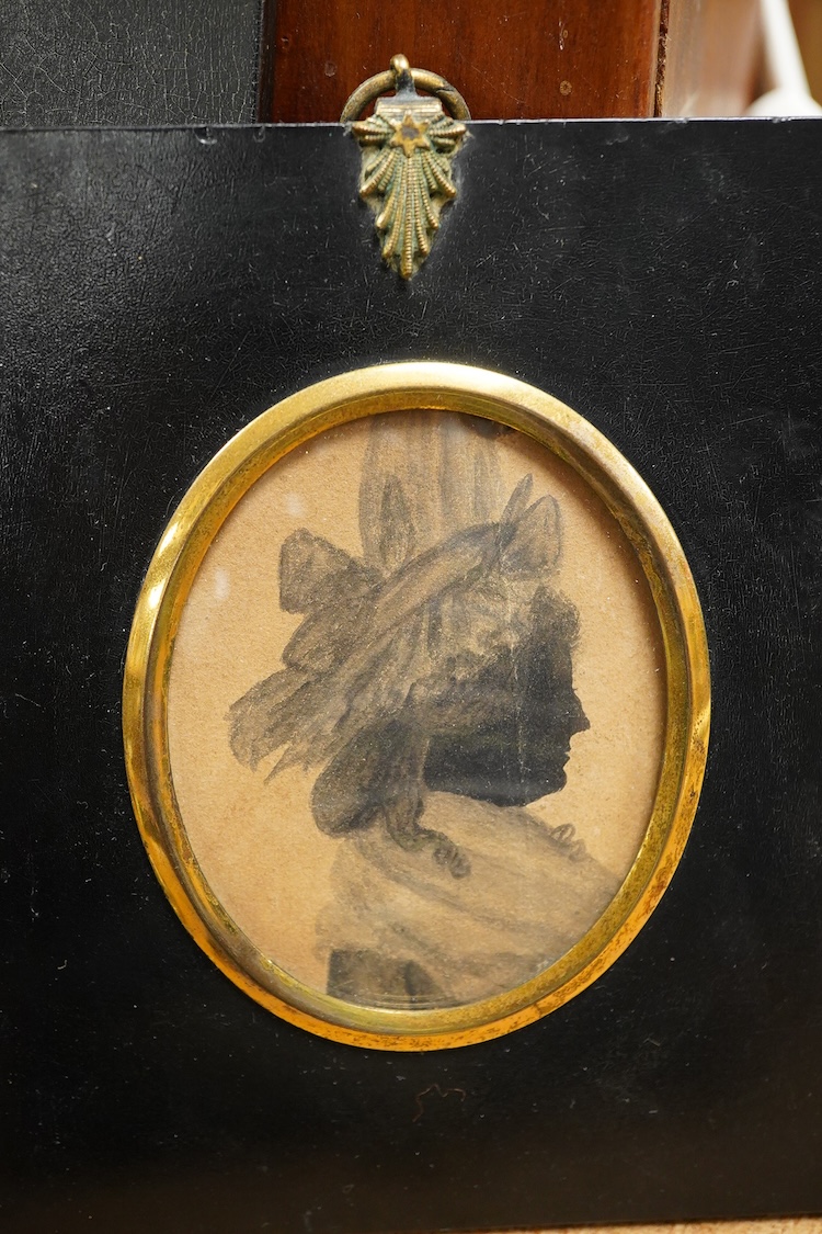 Two 19th century silhouette portraits to include one painted on glass by R. N. Barnes 1836 together with a portrait miniature of a Regency lady and an enamel example, largest 8 x 6.5cm (4)